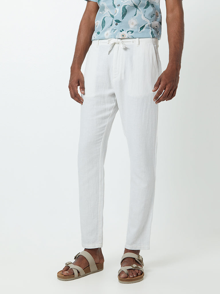 ETA Off-White Slim-Fit Mid-Rise Cotton-Blend Chinos - Image 4