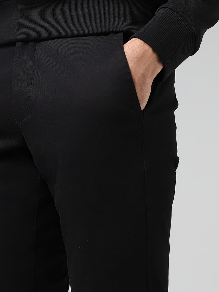 WES Casuals Solid Black Relaxed-Fit Mid-Rise Chinos - Image 2