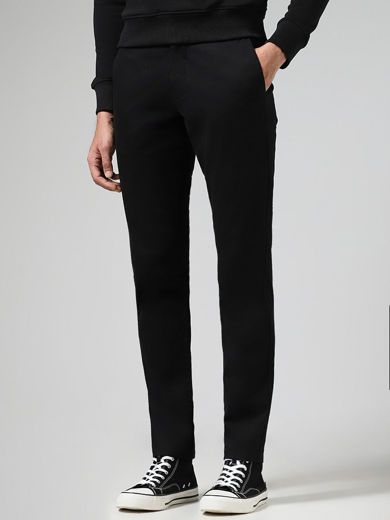 WES Casuals Solid Black Relaxed-Fit Mid-Rise Chinos - Image 3