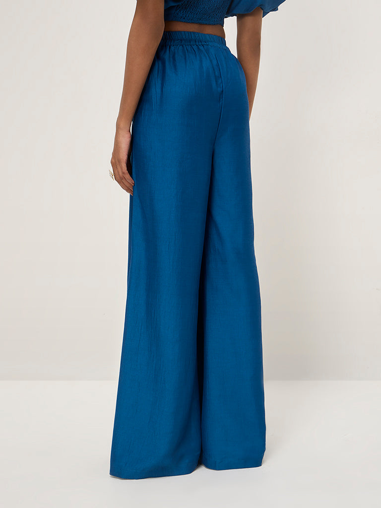 Vark Blue High-Rise Solid Palazzos - Image 3