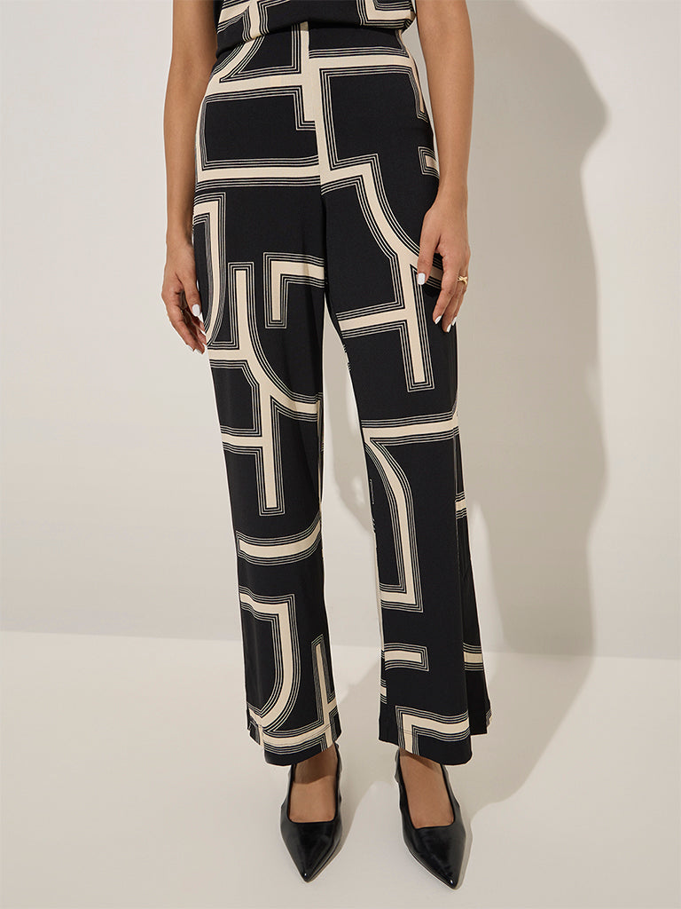 Wardrobe Black Abstract Design High-Rise Trousers - Image 3