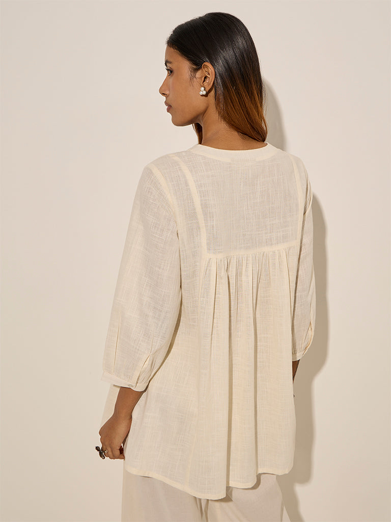 Utsa Cream Floral Embroidered A-Line Cotton Kurti - Image 4