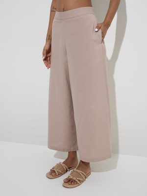 Utsa Beige Solid Cotton Palazzos