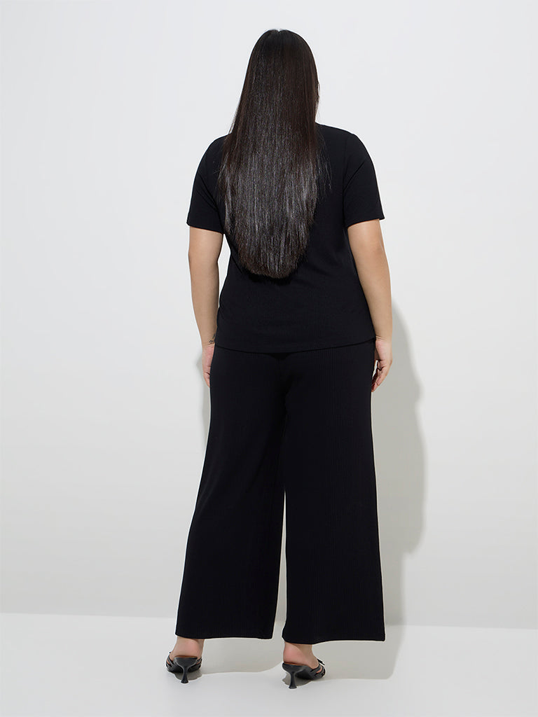 Gia Black Ribbed-Textured High-Rise Trousers - Image 4