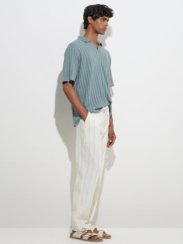 ETA Off-White Stripe Printed Relaxed-Fit Mid-Rise Cotton Chinos