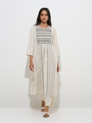 Utsa Beige Embroidered Cotton-Blend A-Line Kurta