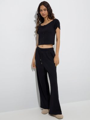 Superstar Black Ribbed High-Rise Cotton-Blend Pants