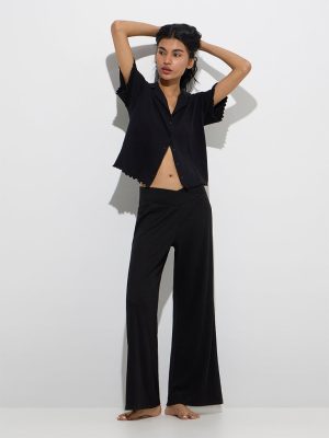 Superstar Black Ribbed-Textured Mid-Rise Cotton-Blend Pants