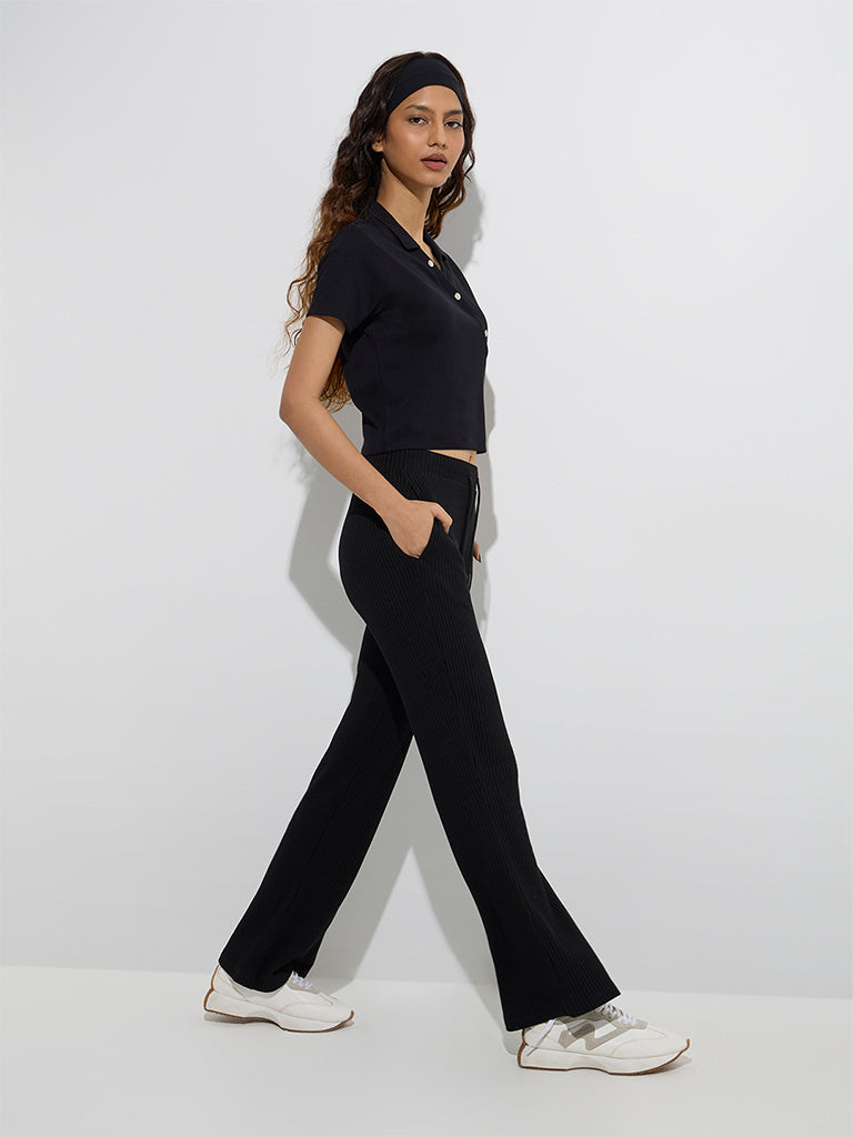 Studiofit Black Textured High-Rise Flared Track Pants