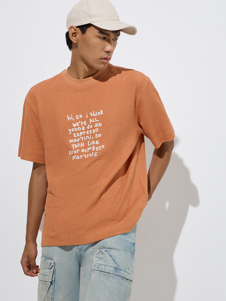 Nuon Orange Text Pattern Relaxed-Fit Cotton T-Shirt