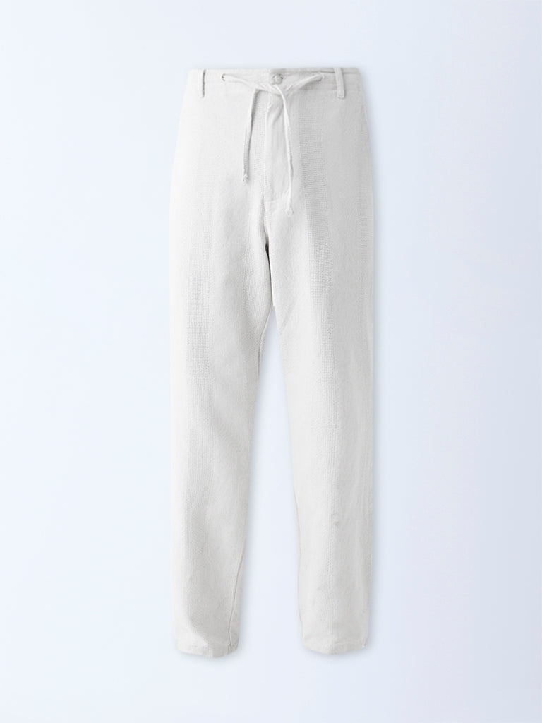ETA Off-White Textured Relaxed-Fit Mid-Rise Cotton Chinos - Image 5