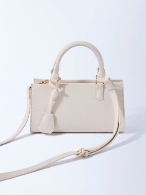 Westside Ivory Textured Sling Bag with Bag Charm
