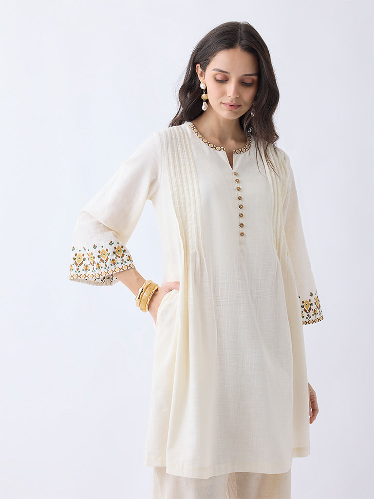Utsa Light Beige Embroidered Cotton A-Line Kurta