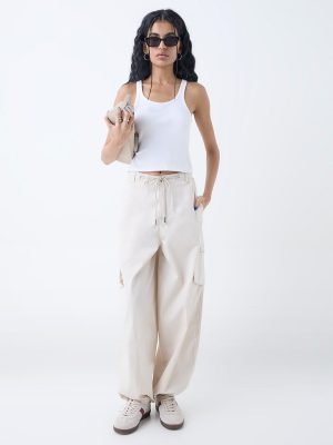 Nuon Cream Mid-Rise Cotton-Blend Baggy Trousers