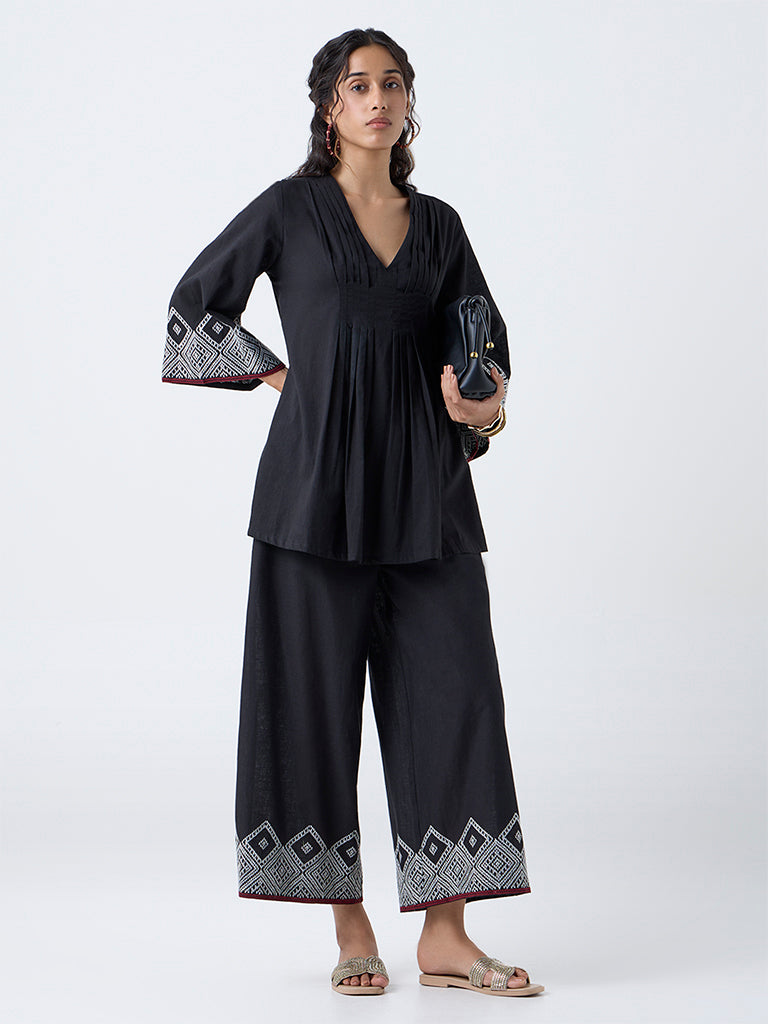 Utsa Black Embroidered Cotton Palazzos - Image 2